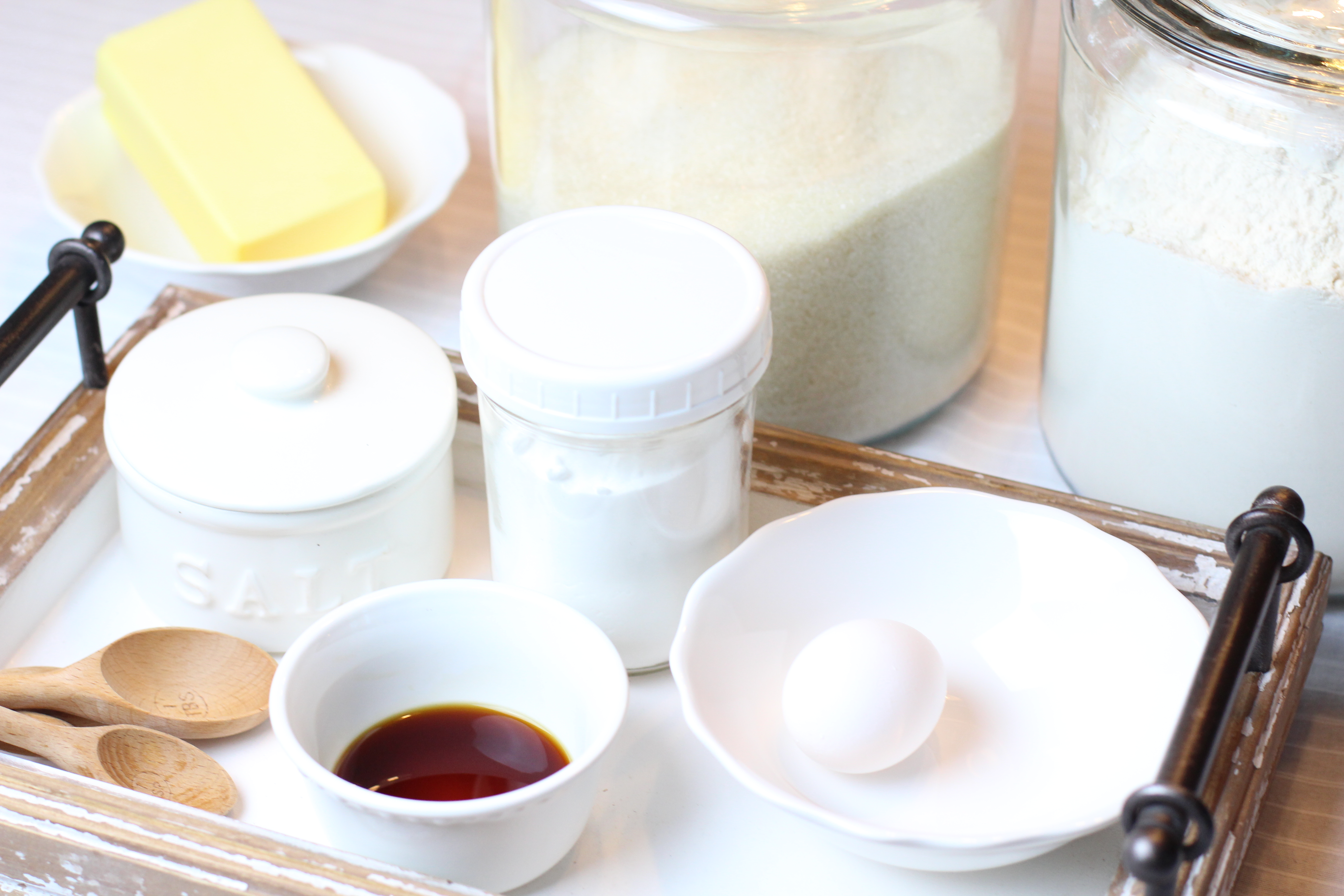 A counter full of baking ingredients to make sugar shortbread cookies.