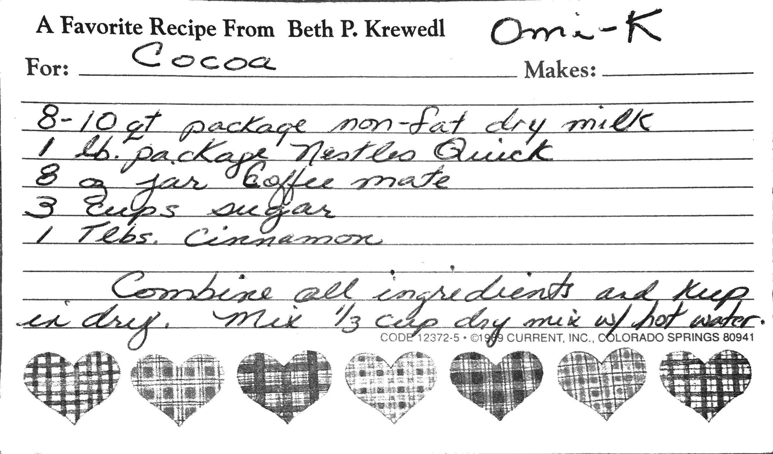 A family recipe card from 1973 that contains the recipe and ingredients for a Homemade Hot Chocolate recipe with powdered milk.