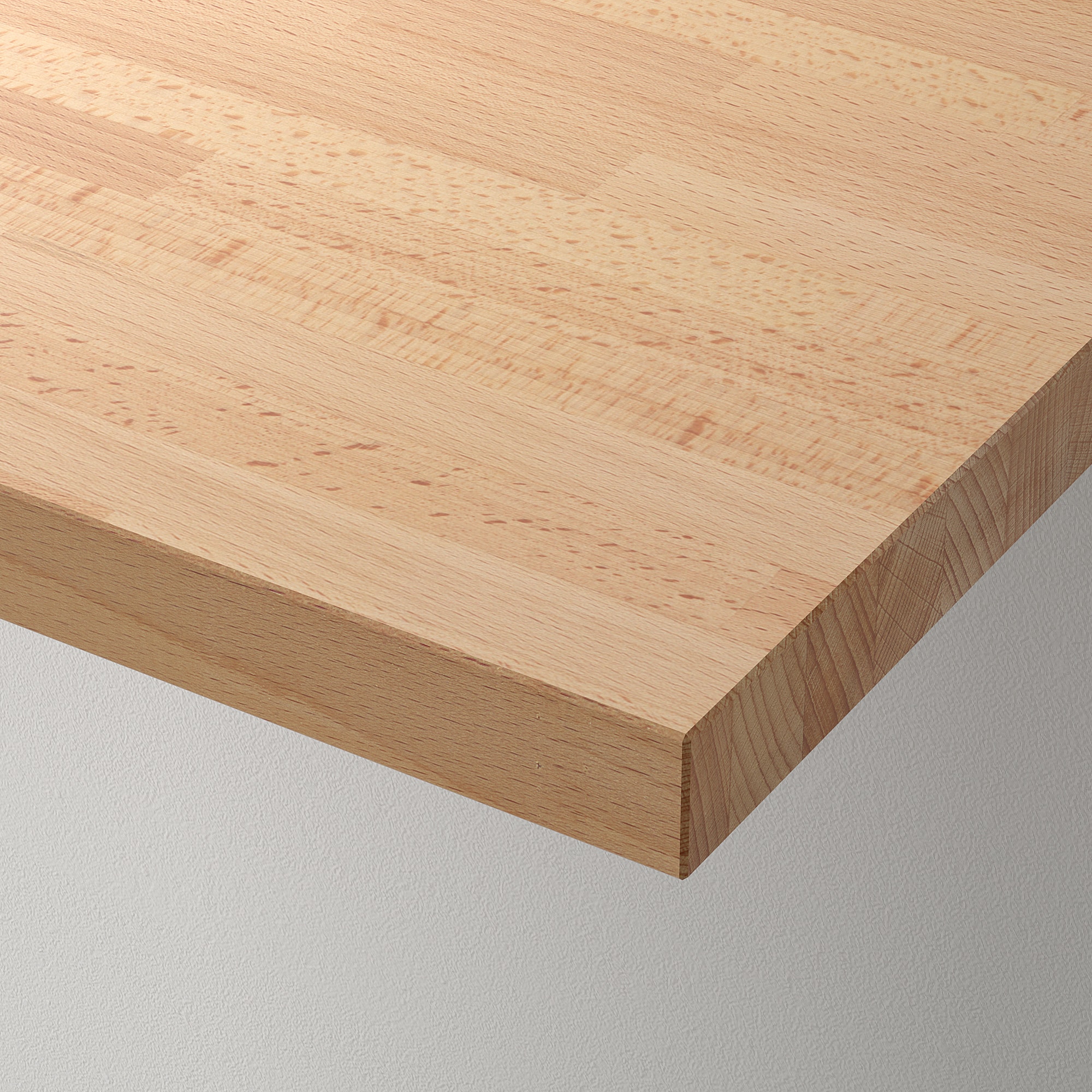 A close-up picture of the wooden desk top to see the details of the wood grain.