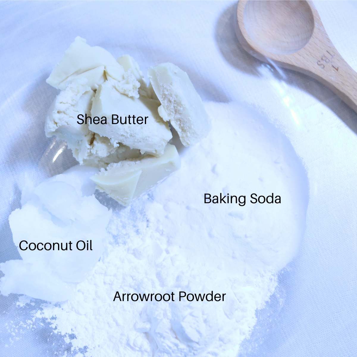 Place all ingredients for DIY natural deodorant into a double broiler pan. Coconut oil, arrowroot powder, baking soda and shea butter.