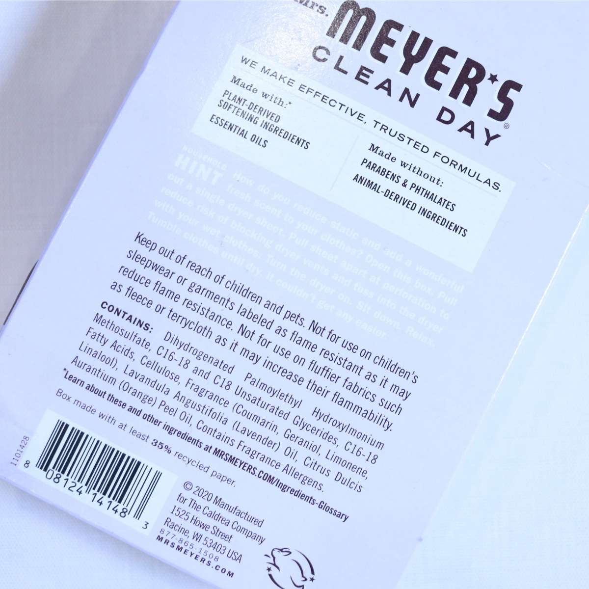 A lavender box of store-bought dryer sheets. The picture is zoomed in to show the harmful chemicals in conventional dryer sheets.